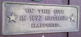 Sign that reads: On this site in 1897 nothing happened here.